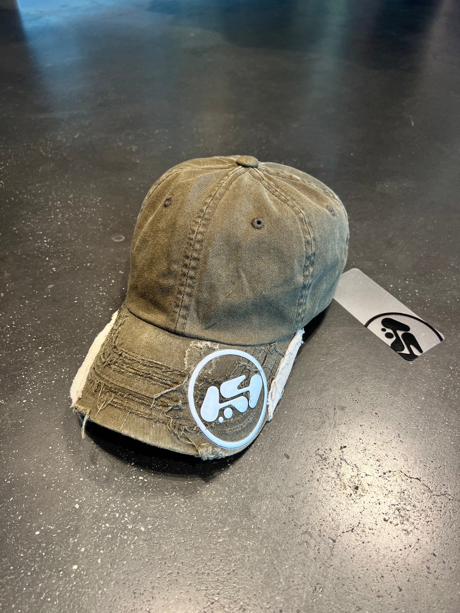 Destroyed logo cap