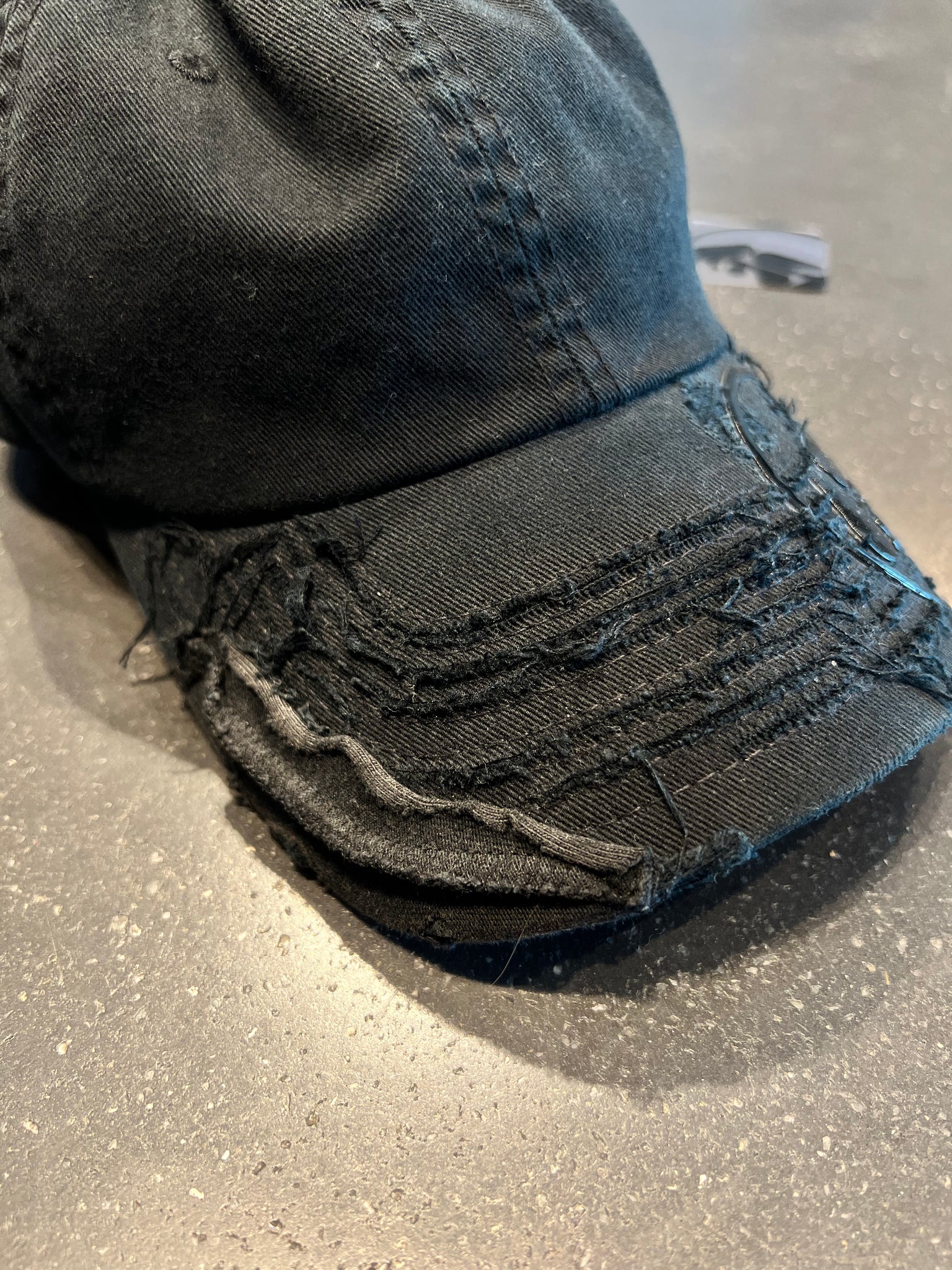 Destroyed logo cap